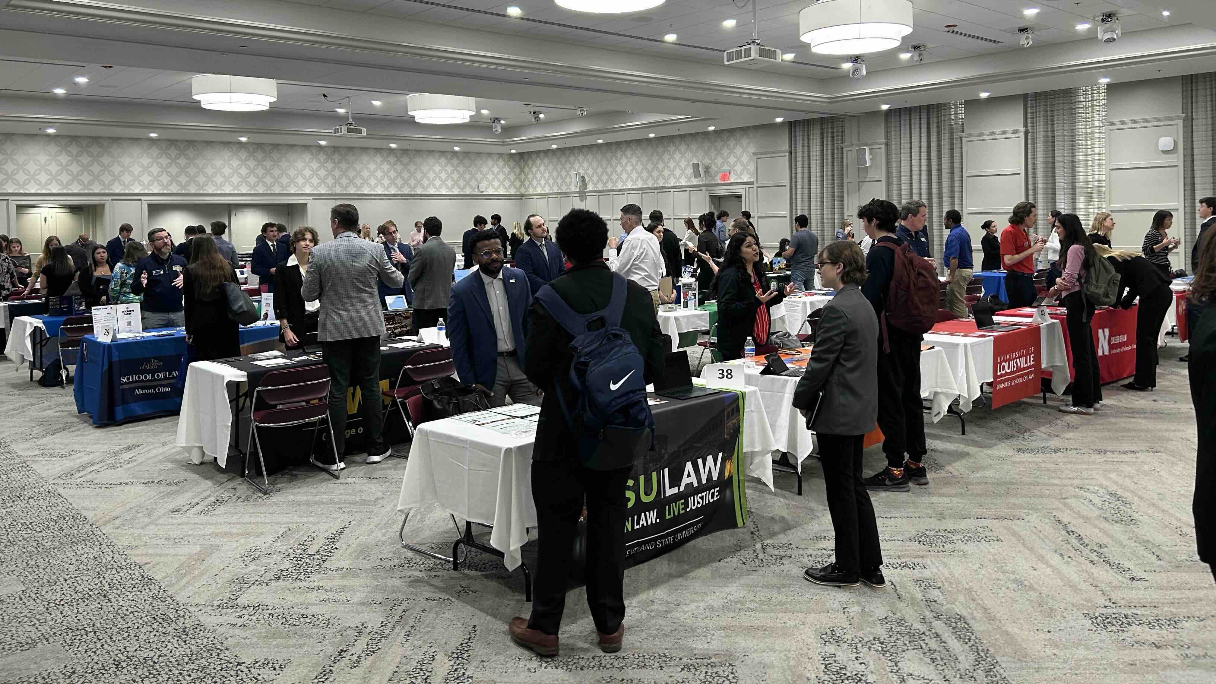 Students speak to Law Fair Day Reps at the Shriver Center