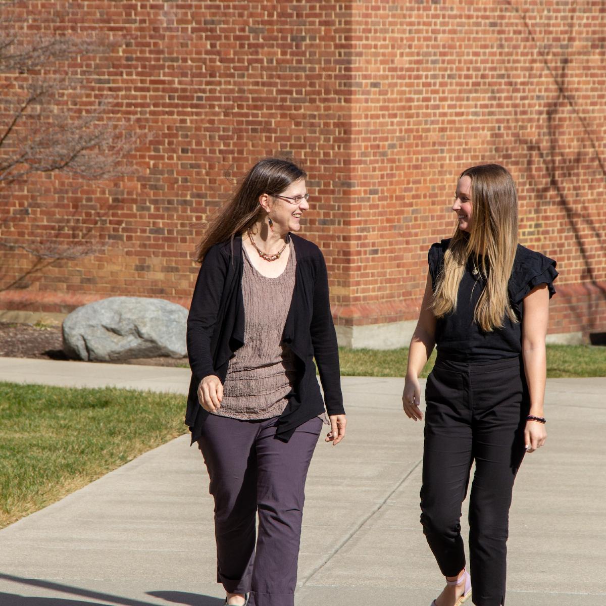 Kasler walking with professor Abbott. 