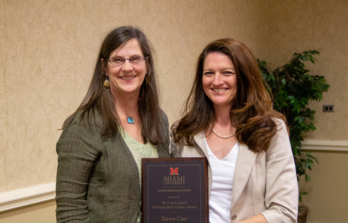 Katy Abbott giving Dawn Carr the Cottrell award. 