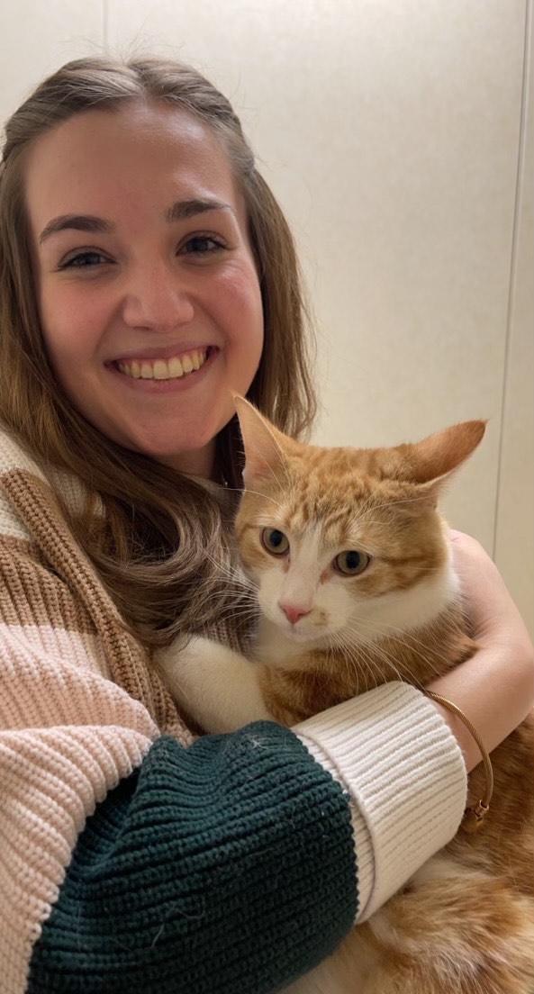 Kate Singer with her cat.