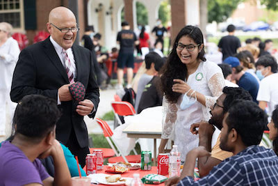 Noshin and President Greg Crawford at a student event.