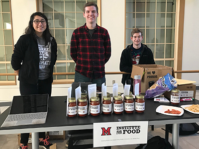 Students sell Institute for Food salsa.