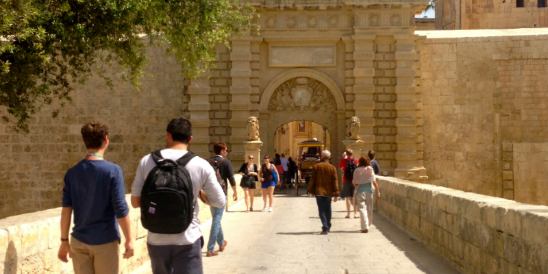 students walking into a building in malta