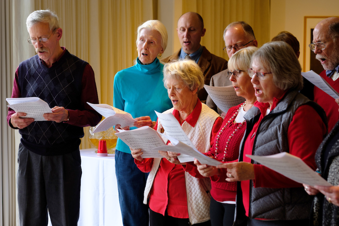 Singers with song sheets