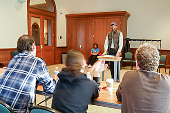 LA Theatre Works members giving a debate workshop