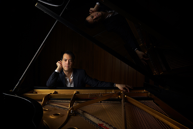 Frank Huang at the piano.