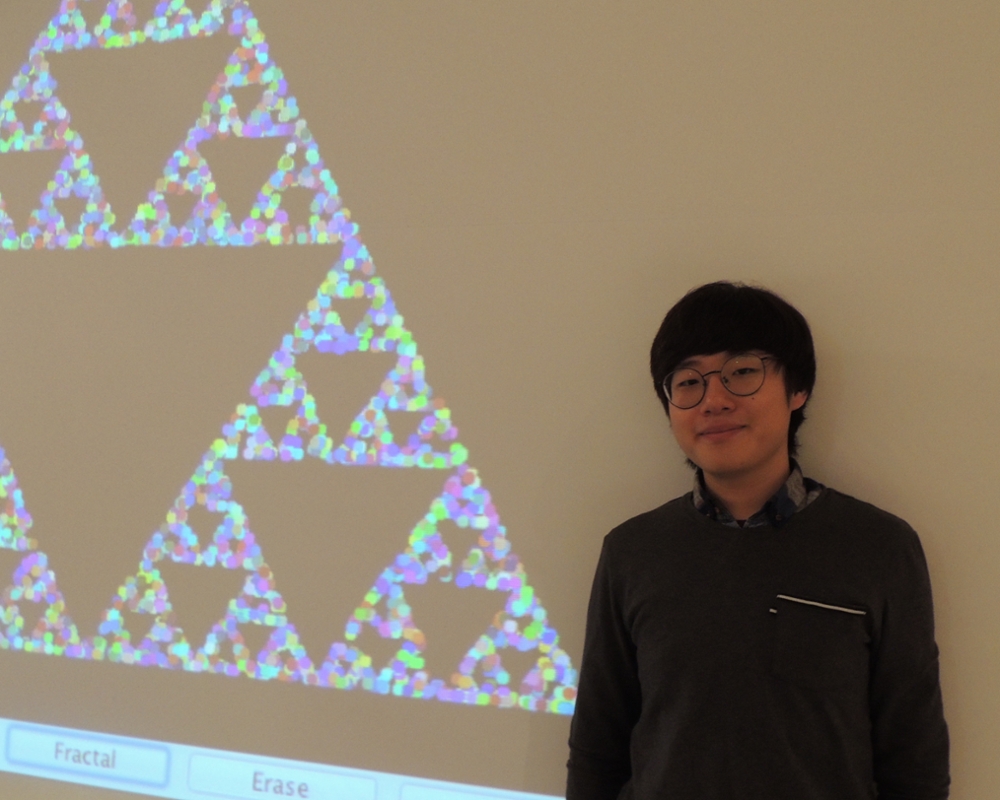 Kwangju Kim with artwork