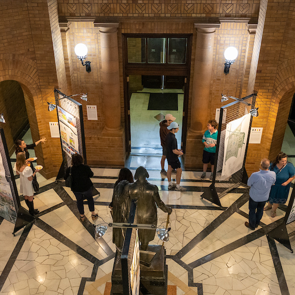 overhead view of exhibition in alumni hall rotunda