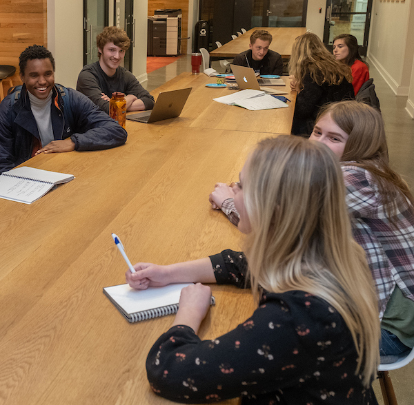 students meeting in a conference room