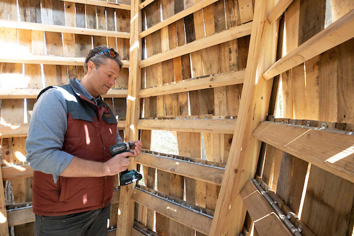 Joel Armor with sculpture at Cincinnati Nature Center