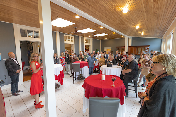 a reception area with lots of people