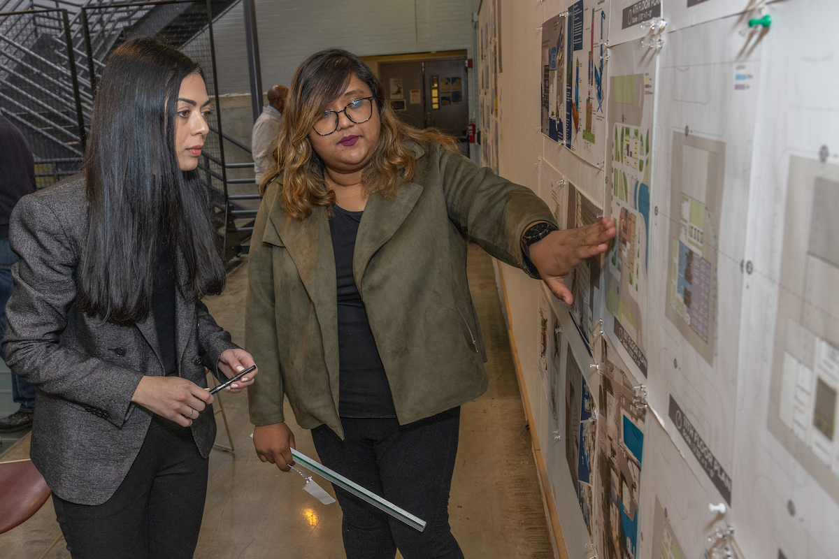 a student talking to another student