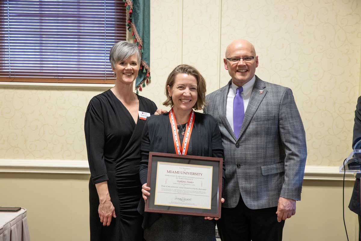 Along with a certificate from President Crawford, Stephanie Danker received a medal in recognition of creativity and innovation.