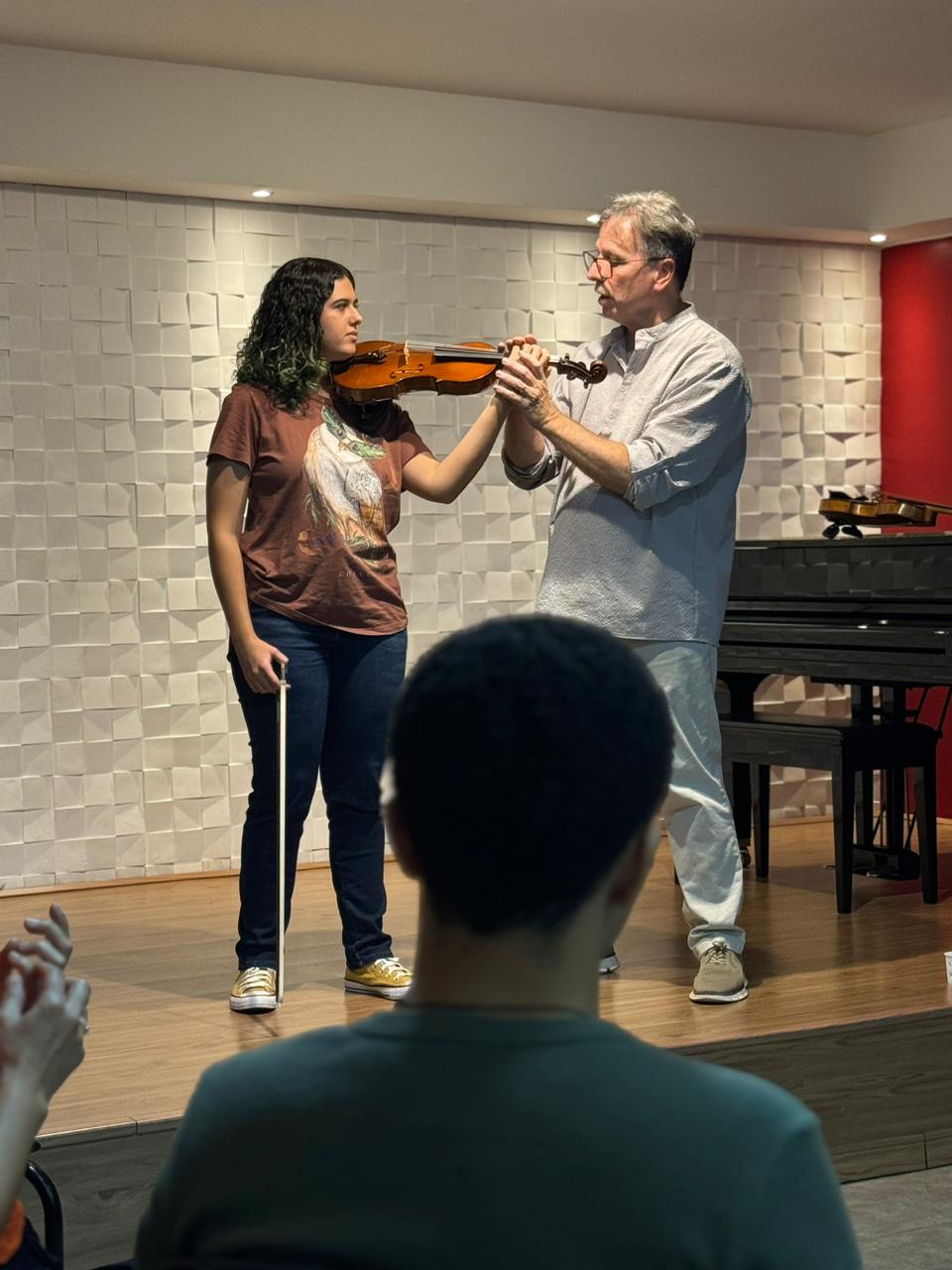 Harvey Thurmer giving instruction to a student