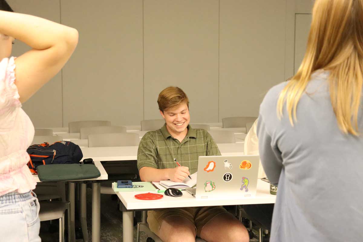 Bradley Beck directing Mallory Branek and Anna Maki