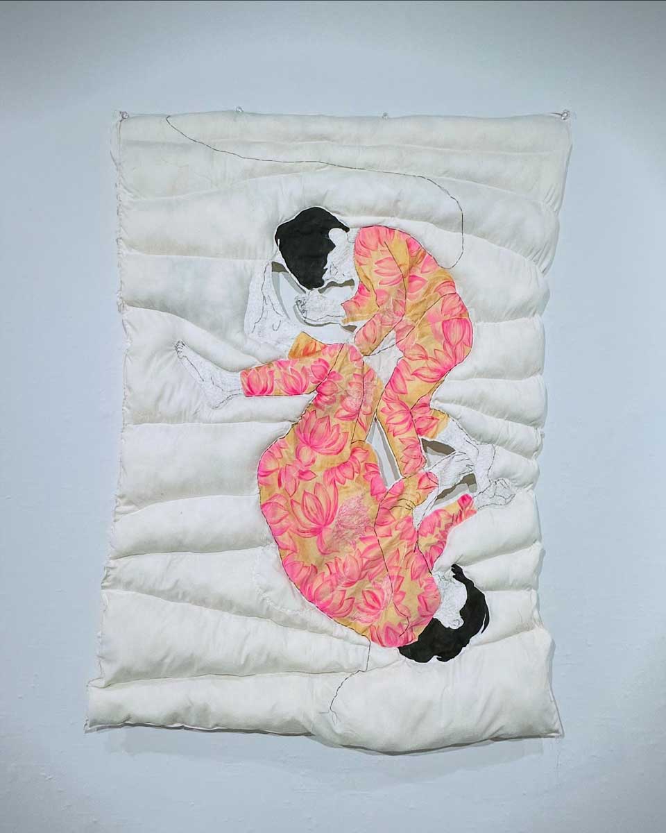 art piece depicting a mother and child sleeping on a mattress