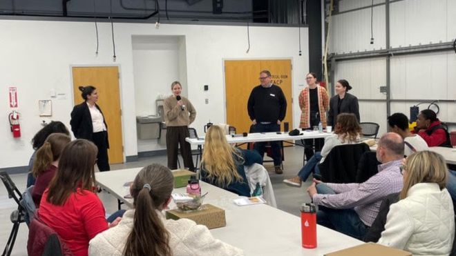 Five panelists speak to a group of Miami University College of Creative Students.