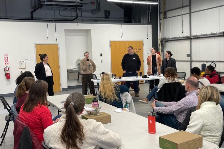 Five panelists speak to a group of Miami University College of Creative Students.