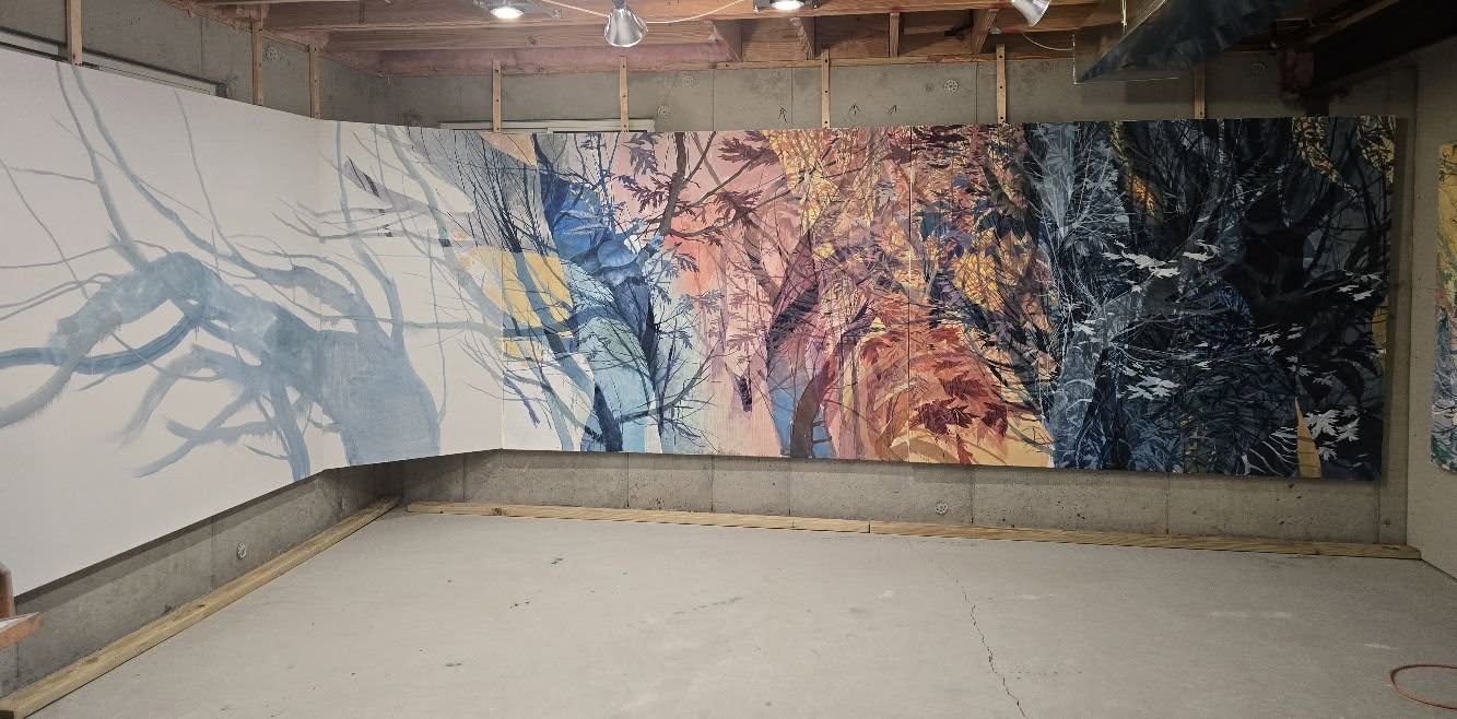 The large scale painting across two walls