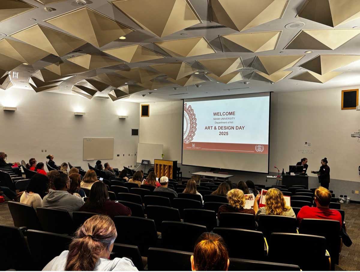 Visitors assembling in room Art 100 for an introduction to the Department of Art, faculty, students and art program offerings.
