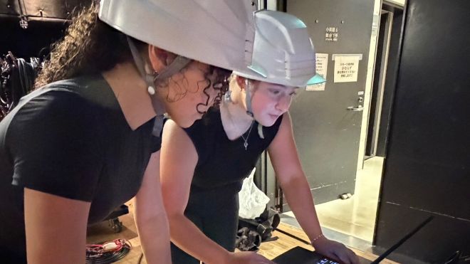 Kalli Vintzel working with another intern