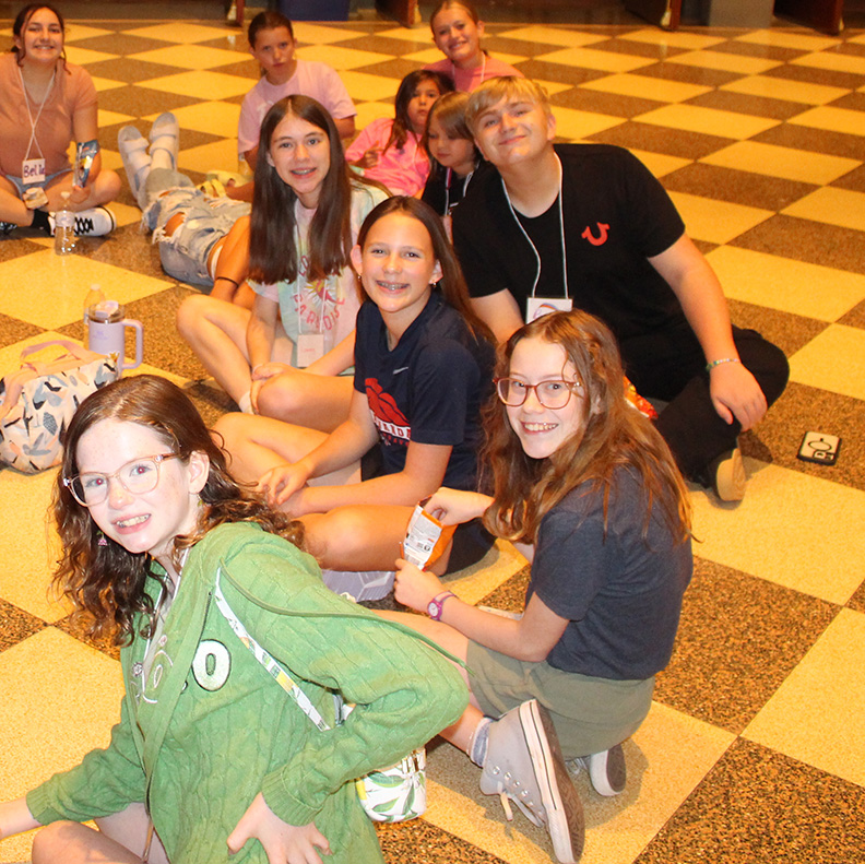 Campers congregate in the lobby of Hall Auditorium to learn lines