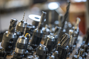 A close up of various drill bits used in mechanical engineering labs