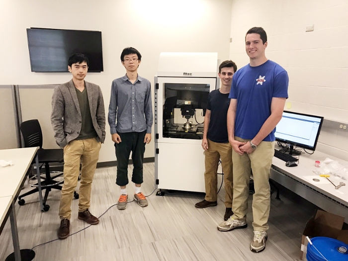 Justin Ye and his students students in an MME lab