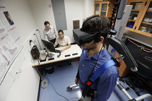 student wearing a vr headset for research