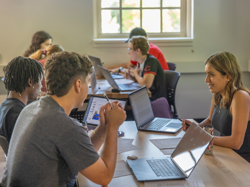 Students working in groups in first year experience lab