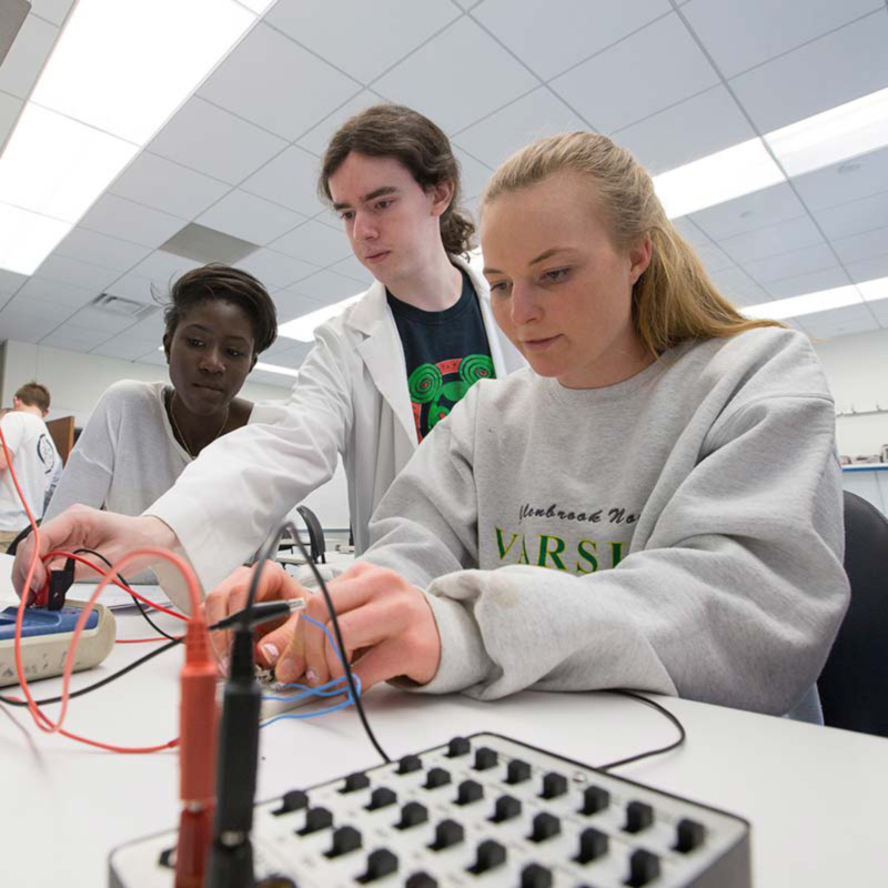 students working with wiring