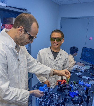 Dr Hui Wang in the Biochem lab with a student