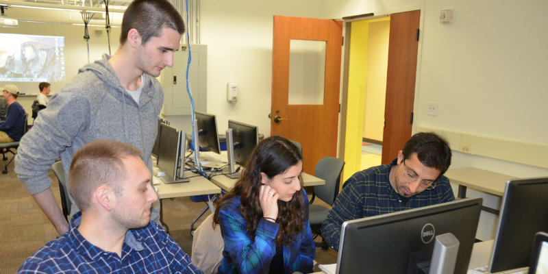 Professor Alomari with a group of students