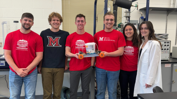 Austin Brooks, Tim Snider, Nathan Simon, Carmen Riano Aransay, Jessica Fornshell, and Brice Graham with the Hydrogen-powered car they created.