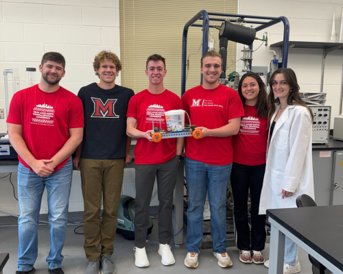 Austin Brooks, Tim Snider, Nathan Simon, Carmen Riano Aransay, Jessica Fornshell, and Brice Graham with the Hydrogen-powered car they created.