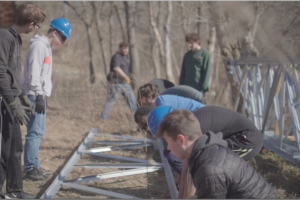 Miami students participating in an EWB bridge-building project.