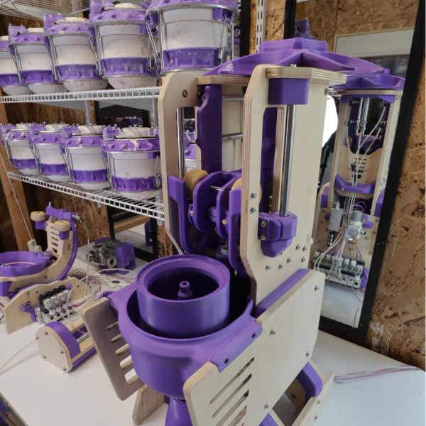 One of Pratt’s glazing machines. Mug molds pictured in the background.