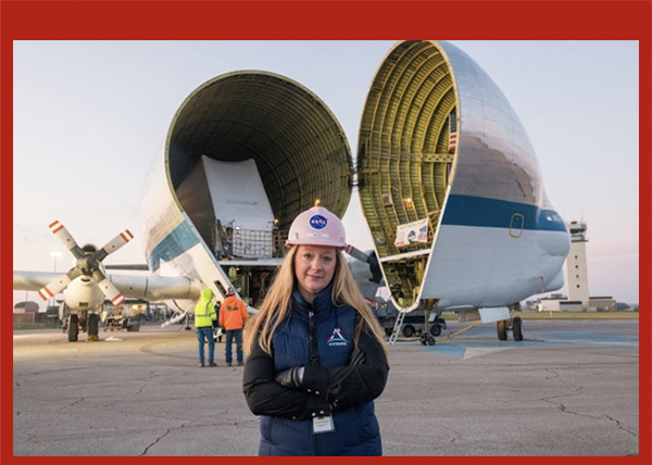 Nicole Smith with NASA's Aero Spacelines Super Guppy that transported the Orion spacecraft..