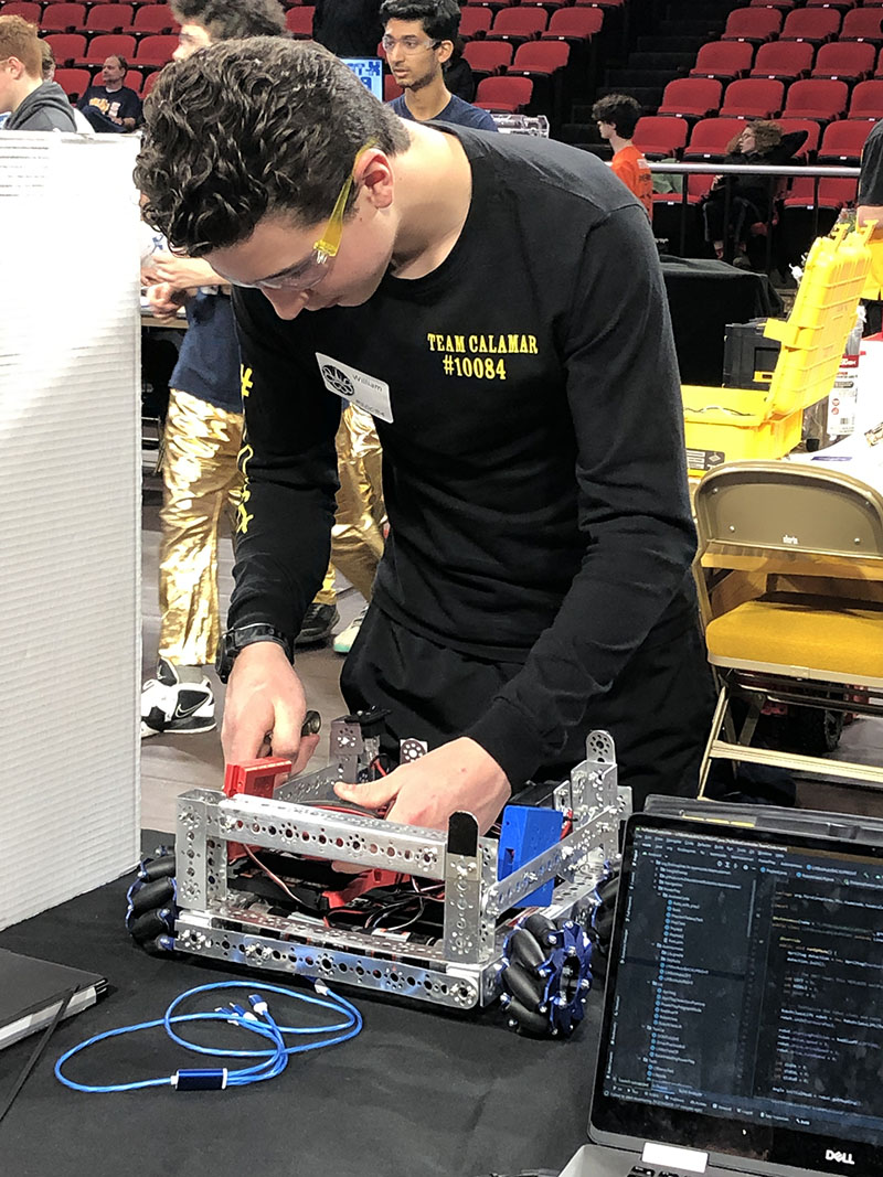 Student get his robot ready.