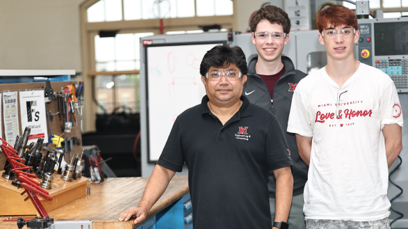 Muhammad Jahan, Ph.D., in the Miami University MME High Bay Lab in Oxford, Ohio, with two student members of his research team.