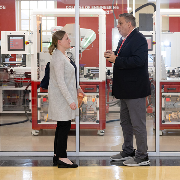 professor speaking to a student