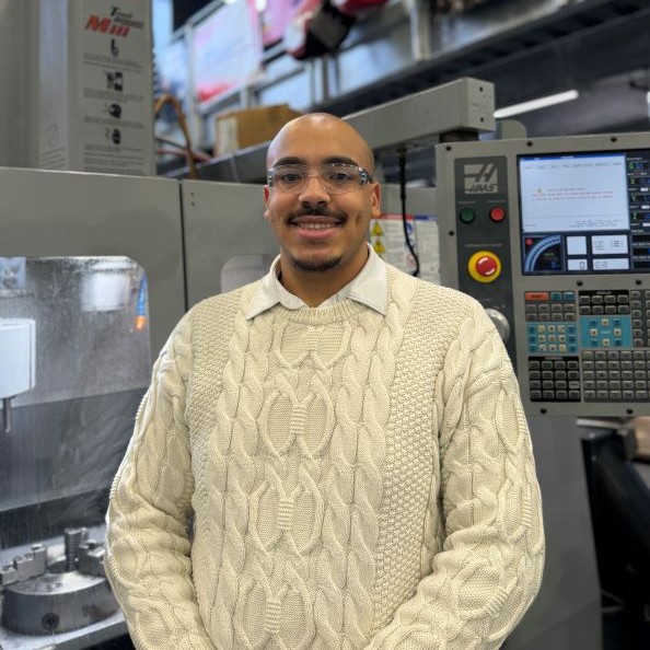Sim Ouma working in a lab.
