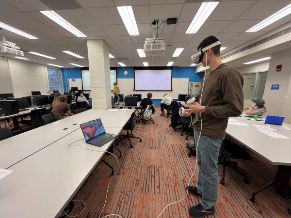 Male student using a VR Headset