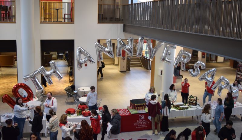 large silver and red balloons spelling 10th Anniversary 