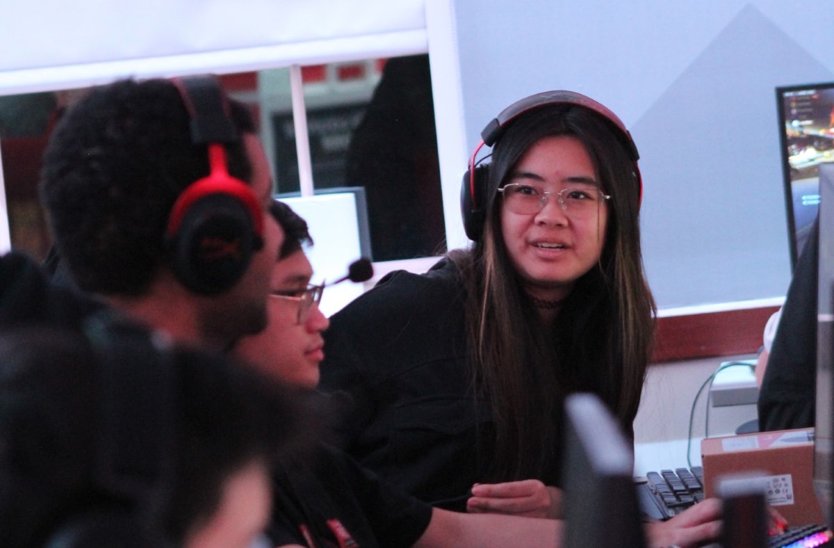 New students play games together at the esports open house meeting members of the club and varsity teams