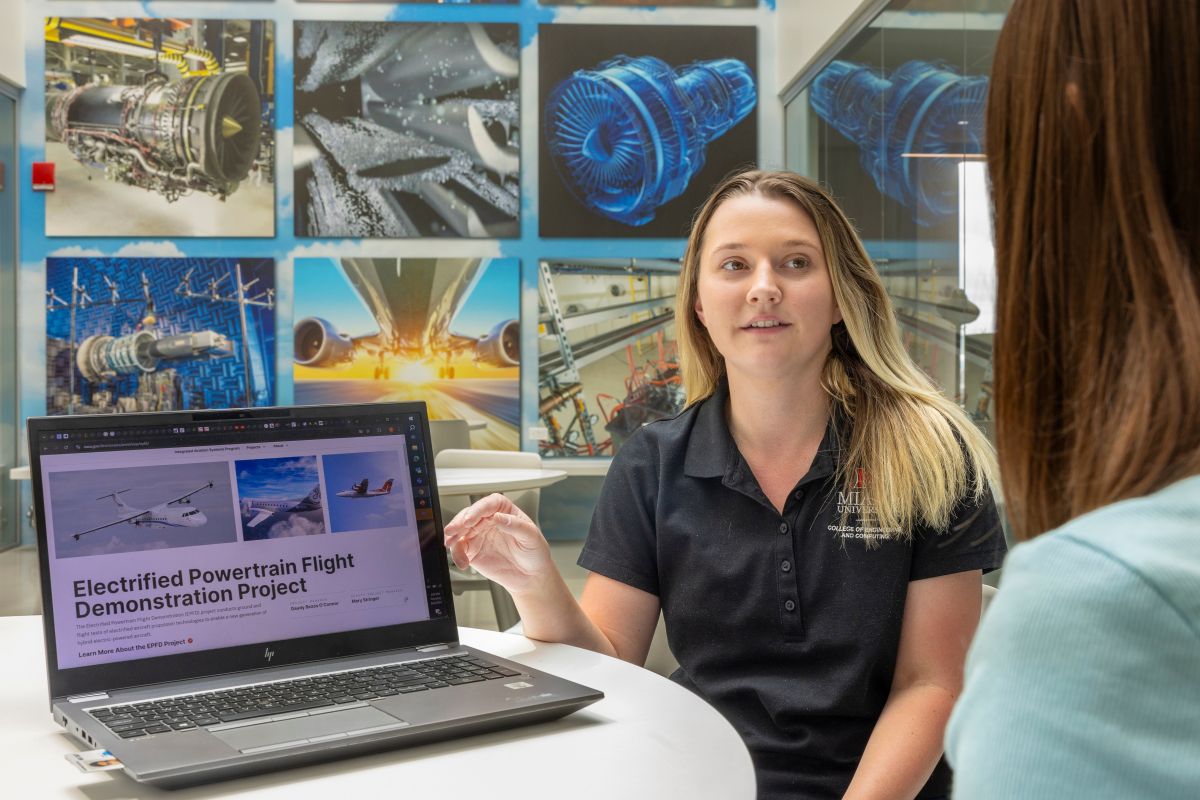 A NASA intern presents on an electrified powertrain flight demonstration project.