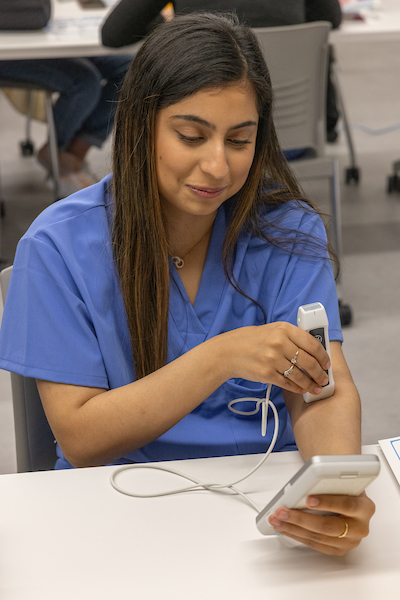 Nursing student working in a lab