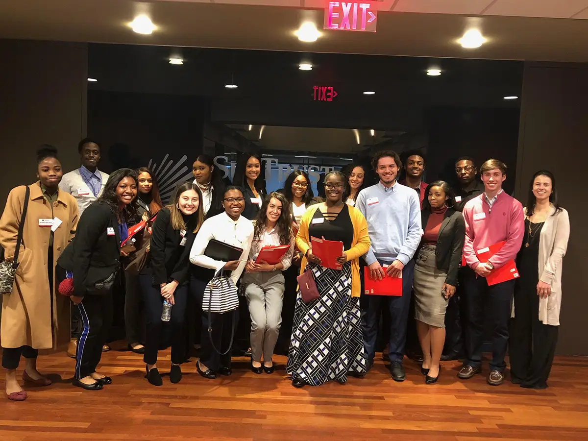 Miami students posing for a photo at a Career Academy employer visit