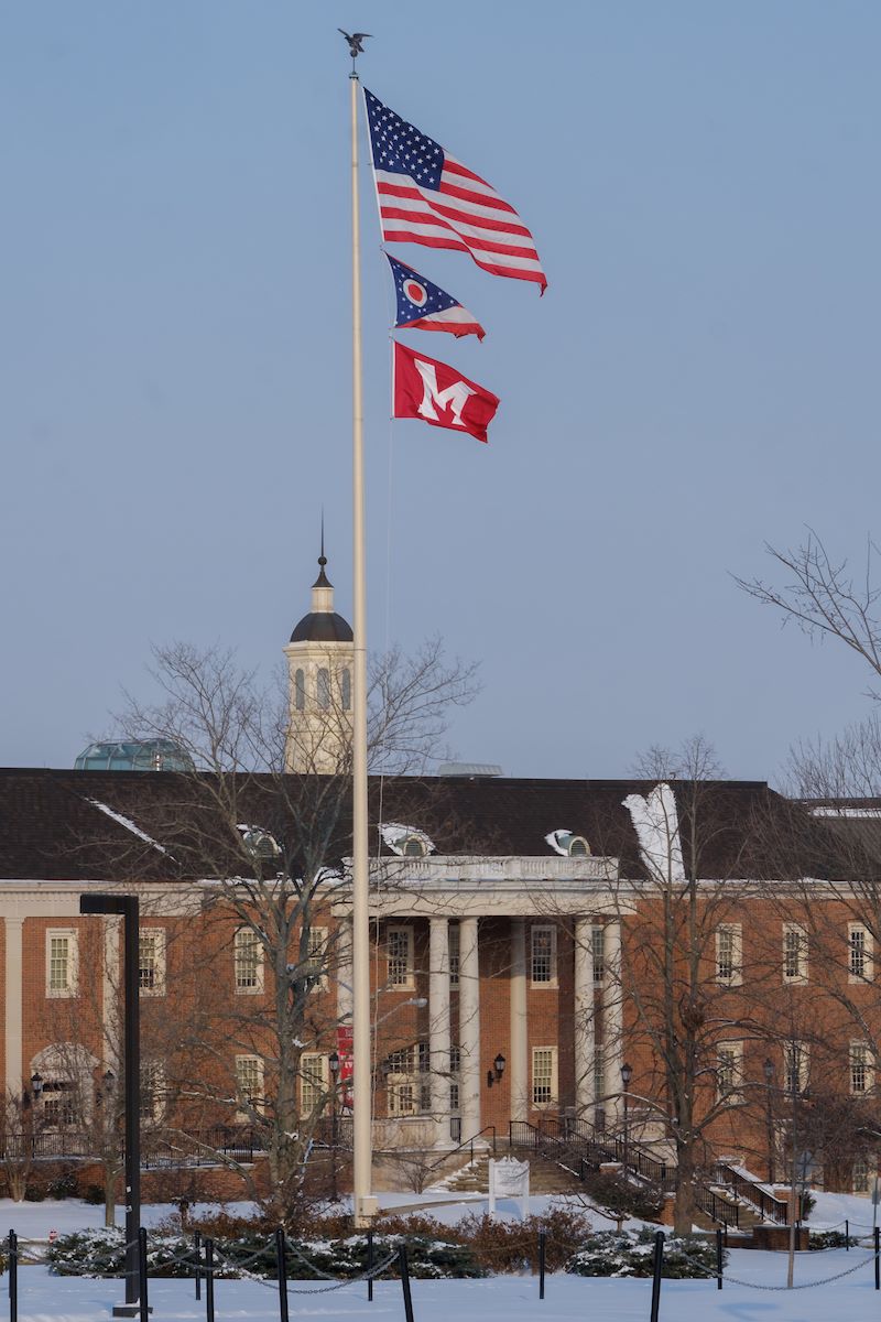 U.S. and Ohio State flags in front of Roudebush Hall