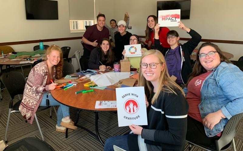 10 students at MPACT, putting together geriatric care bags